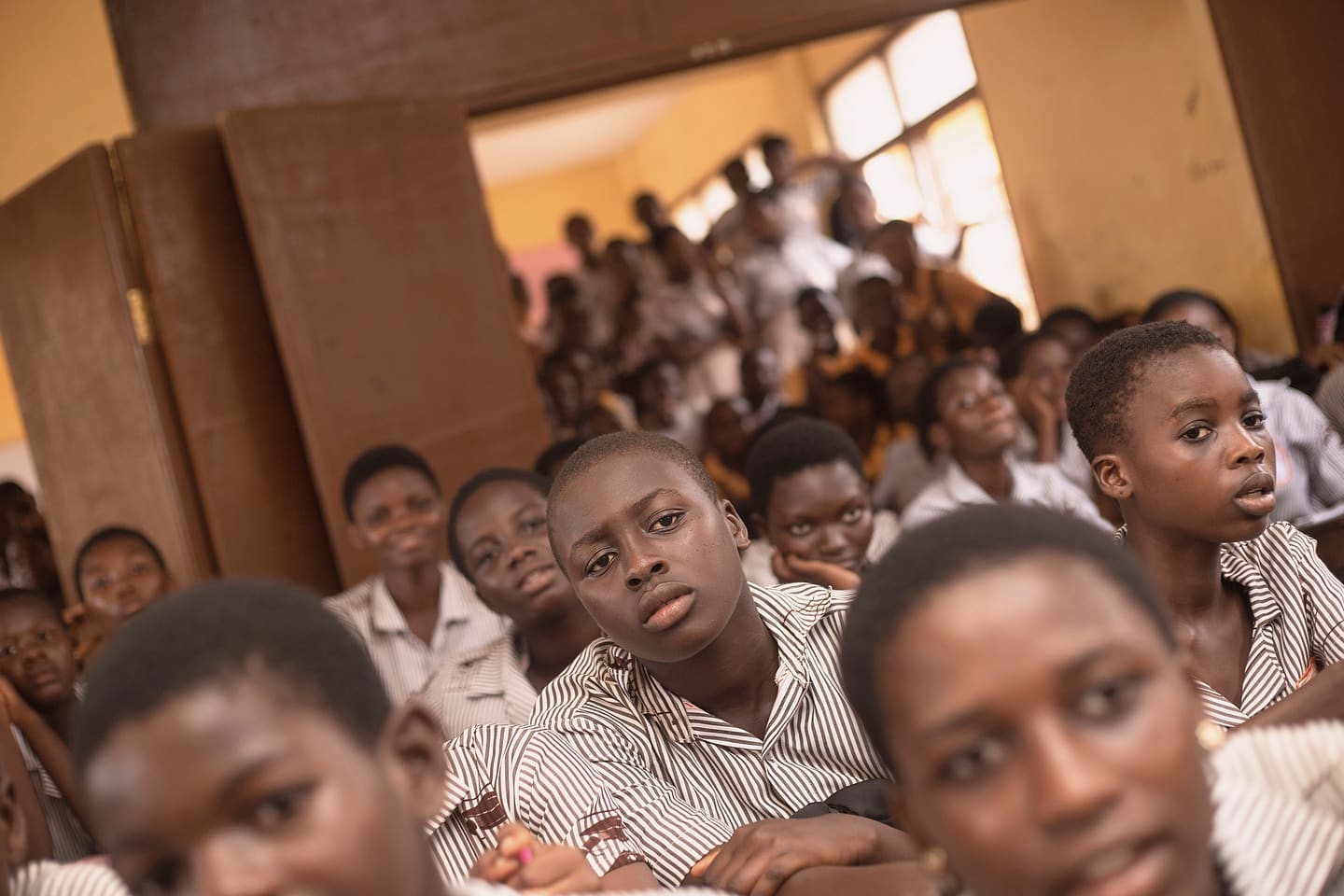Classroom full of attentive young pupils